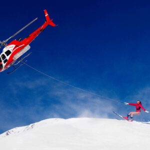 Ski Lift, St. Moritz by Tony Kelly, Helicopter pulling a Model on ski