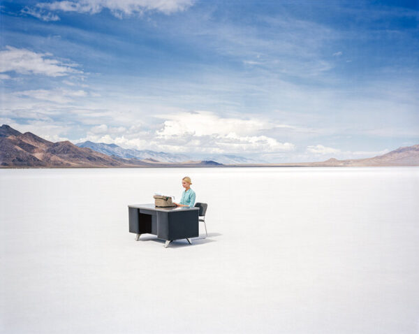 Shields, Typewriter 2018, secretary sitting in a salt desert