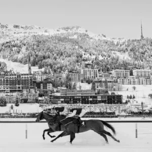 David Yarrow Dancing on Ice St Moritz Switzerland 2024, horserace in St. Moritz in the Snow in Winter, two horses racing