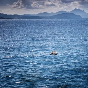 Derabin Mystic Waters woman floating in the ocean