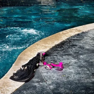 drebin splash and heels pink shoes next to a pool