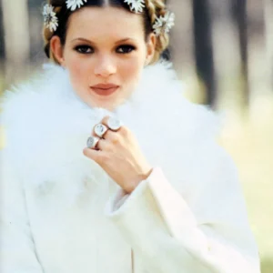 Kate Moss Vogue Italia 1992 by Arthur Elgort white fur coat and flower crown