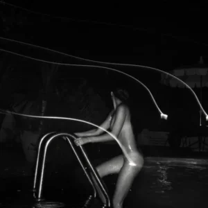 Klinko Chateau Marmont The Pool, nude model climbing out of a pool at night