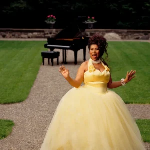 White Aretha Franklin yellow ballgown garden piano