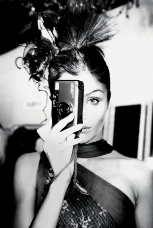 Portrait of Helena Christensen with Point and Shoot Camera