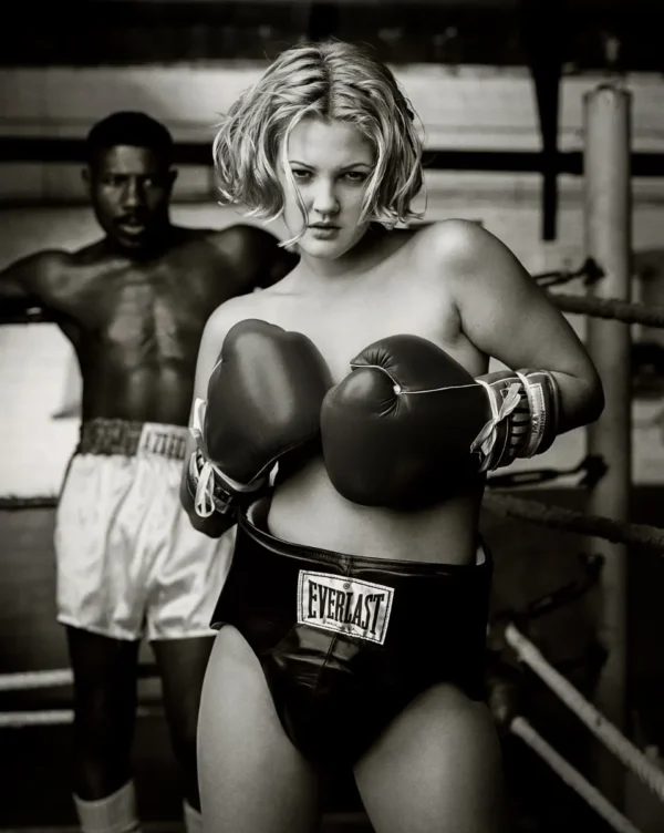 Mark Seliger, Drew Barrymore Boxing 1993, black and white topless portrait in boxing gloves